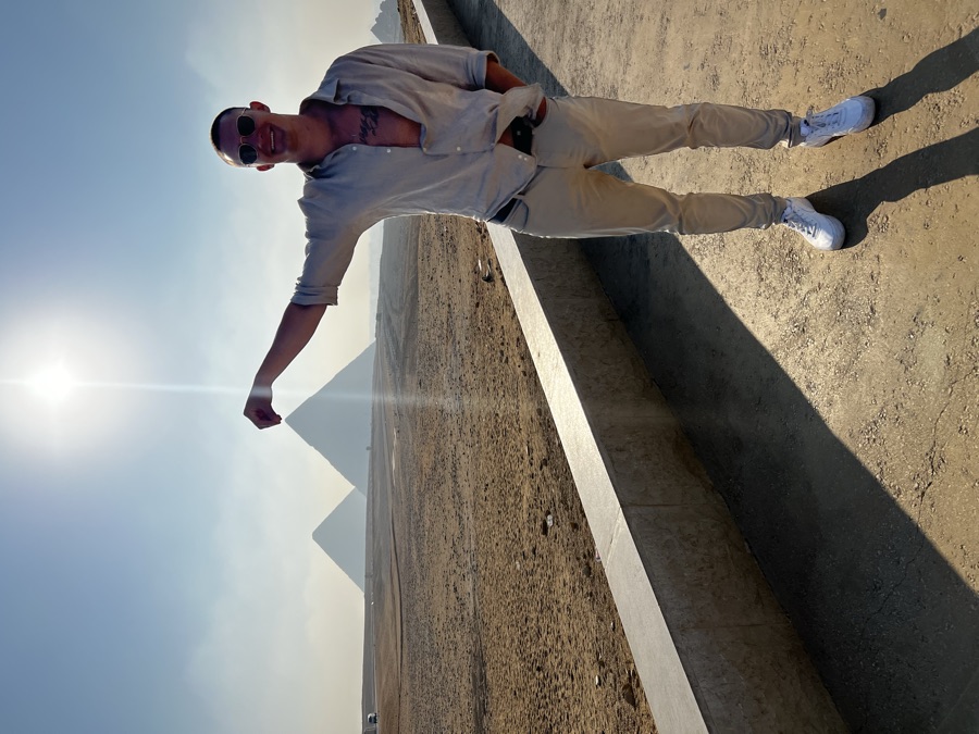Pointing at the Great Pyramids of Giza